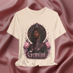 Soft cream T-shirt with a graphic design of a woman with 'Gemini' text on a textured brown background