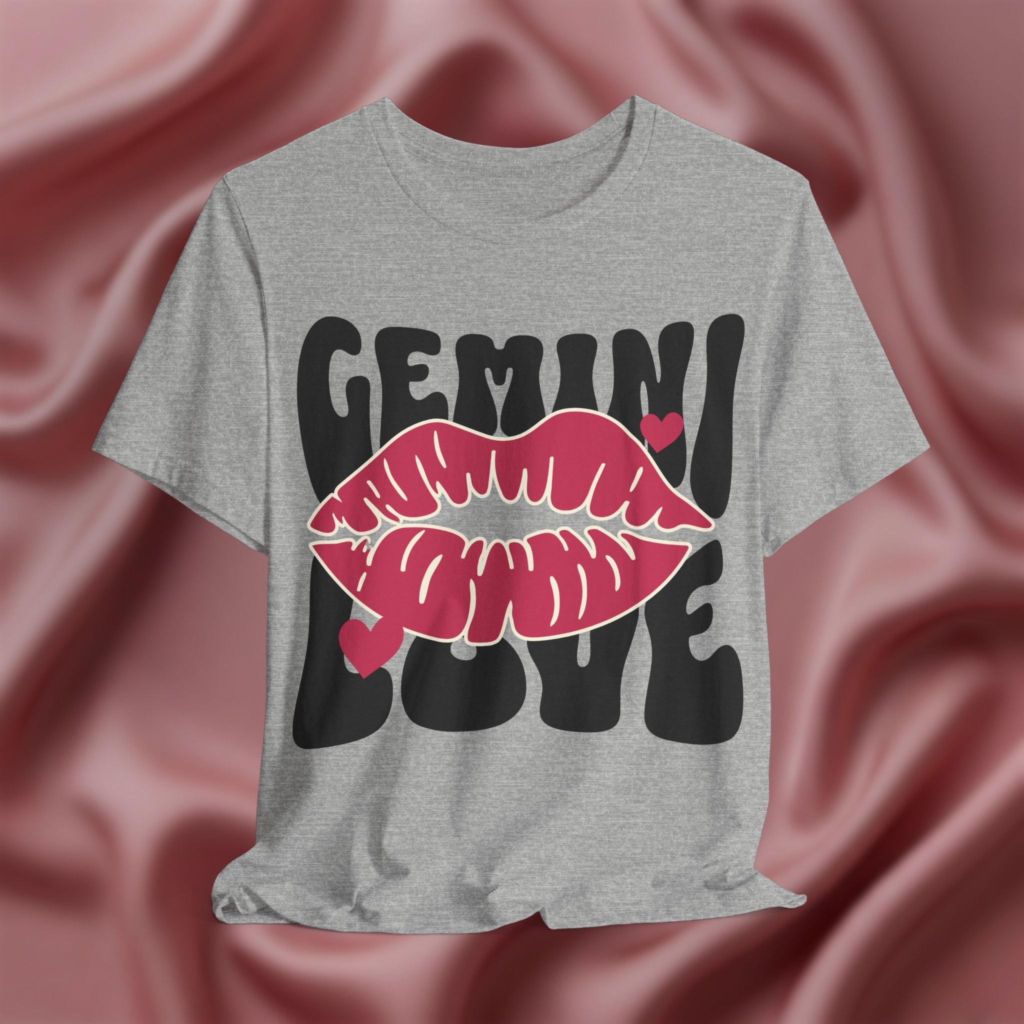 Gray t-shirt with 'GEMINI LOVE' design featuring lips on a pink fabric background