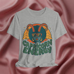 Gray t-shirt with Capricorn Energy design on a pink fabric background