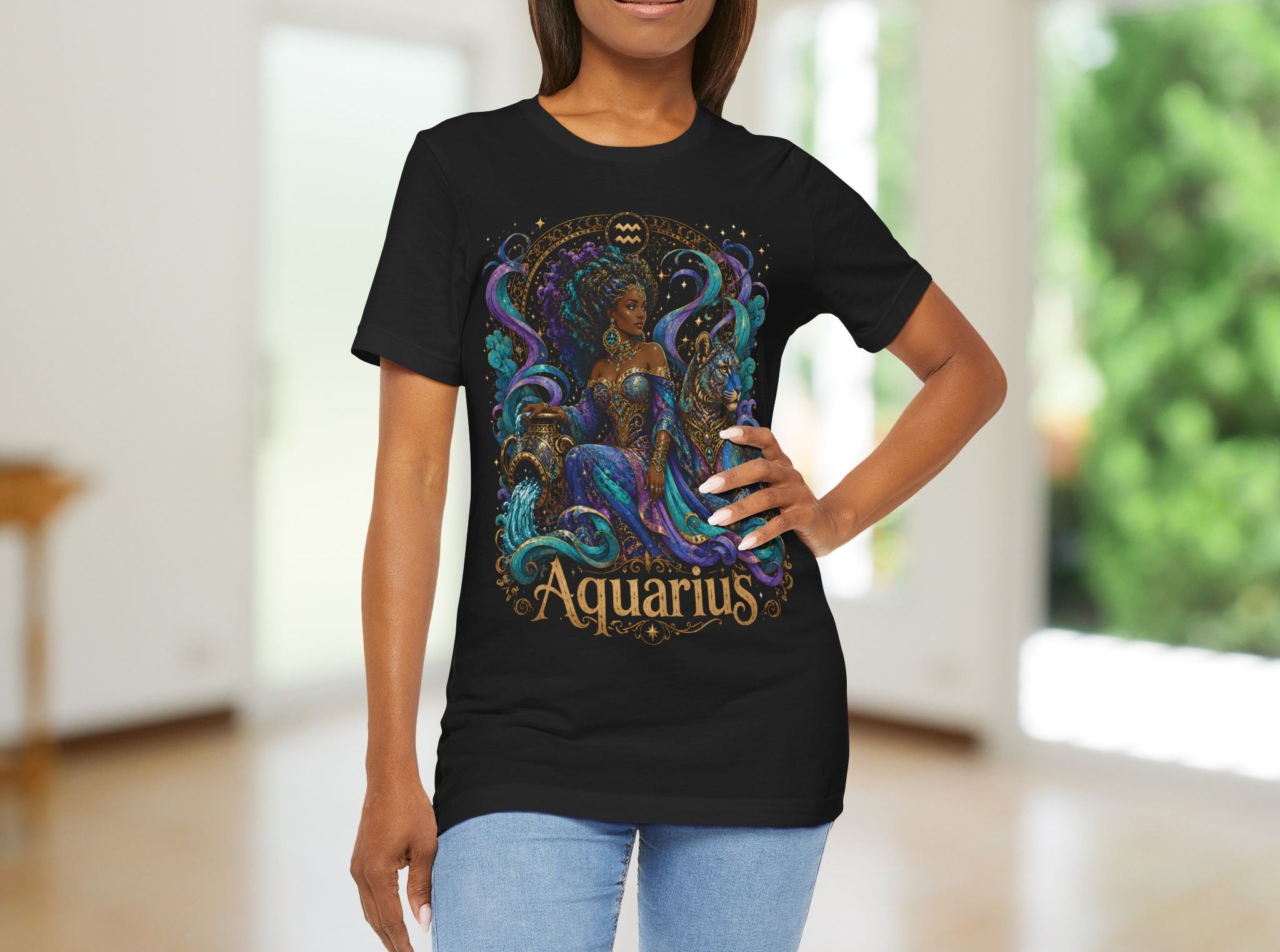 Woman wearing a black t-shirt with 'Aquarius' design in a blurred indoor setting