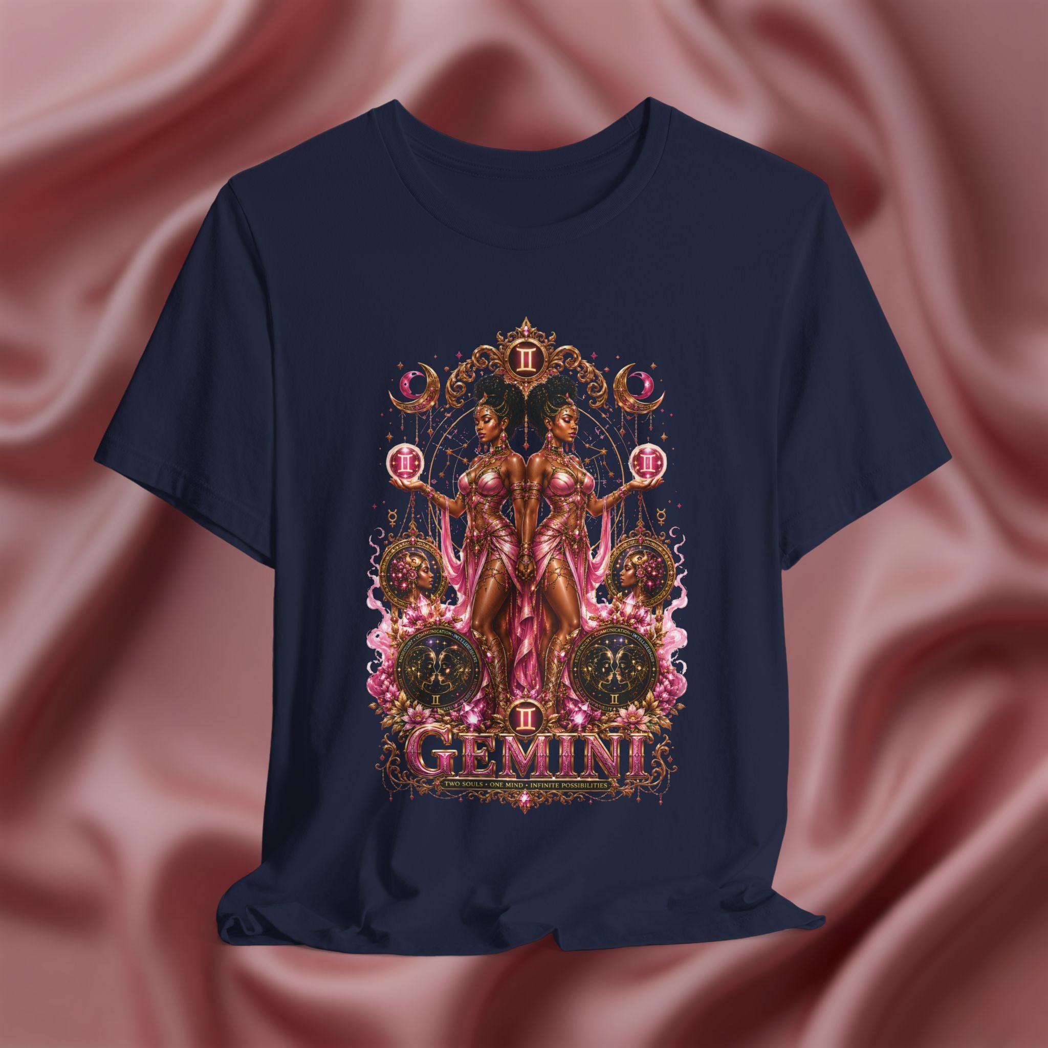 Navy blue t-shirt with Gemini zodiac design on a pink fabric background