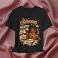 Black t-shirt with Capricorn zodiac design on a pink fabric background