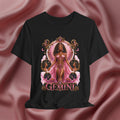 Black t-shirt with 'Gemini' design featuring a woman in a pink dress on a pink fabric background