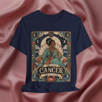 Navy blue t-shirt with Cancer zodiac design on a pink fabric background