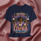 Navy blue t-shirt with Libra zodiac design on a pink fabric background