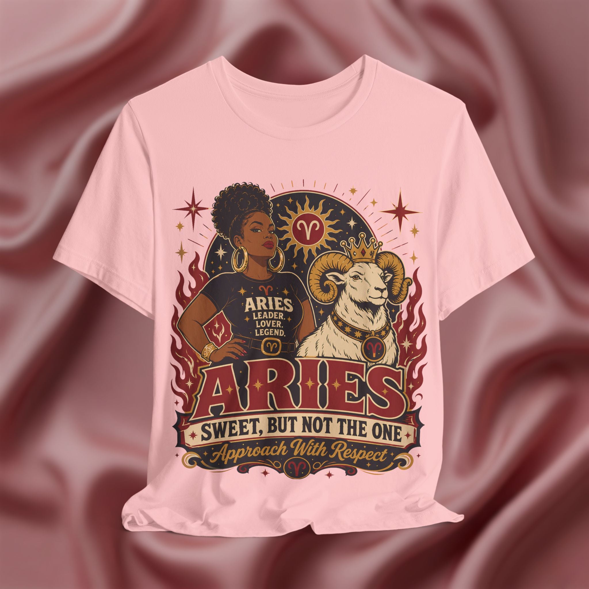 Pink T-shirt with Aries zodiac design on a textured red background