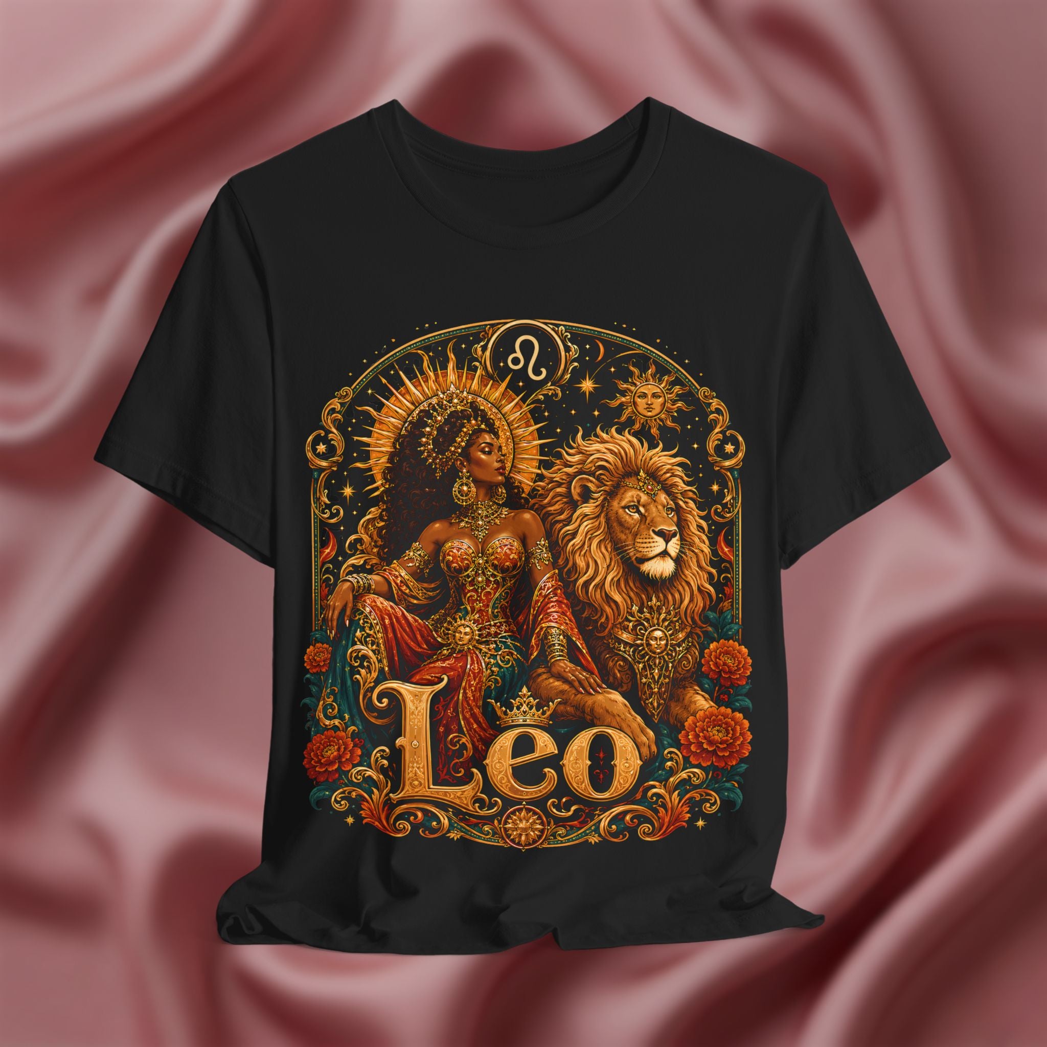 Black t-shirt with Leo zodiac design on a pink fabric background