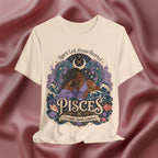 Soft cream T-shirt with Pisces zodiac design on a textured red background