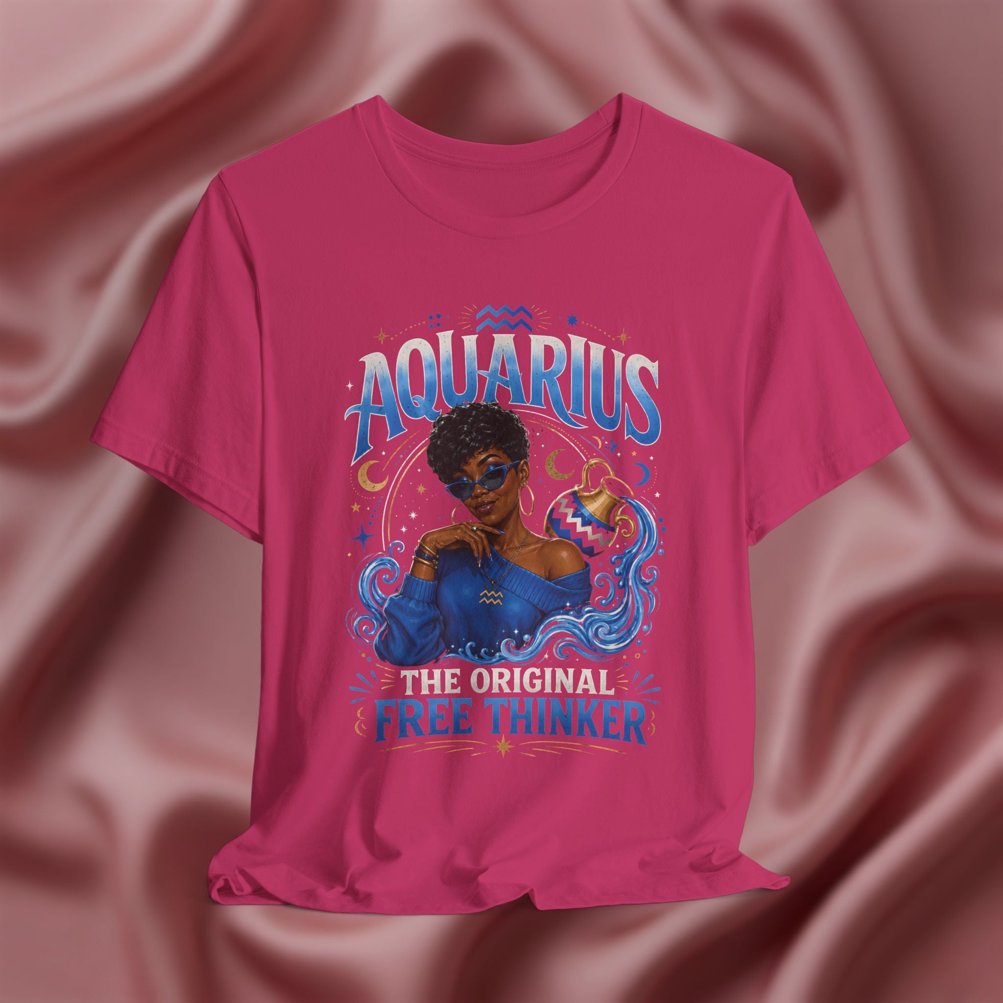 Pink t-shirt with Aquarius design featuring a black woman and text 'The original free thinker' on a pink fabric background