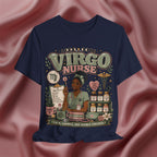 A navy blue graphic t-shirt featuring a detailed illustration of a Virgo nurse surrounded by medical supplies, set against a draped pink satin background.