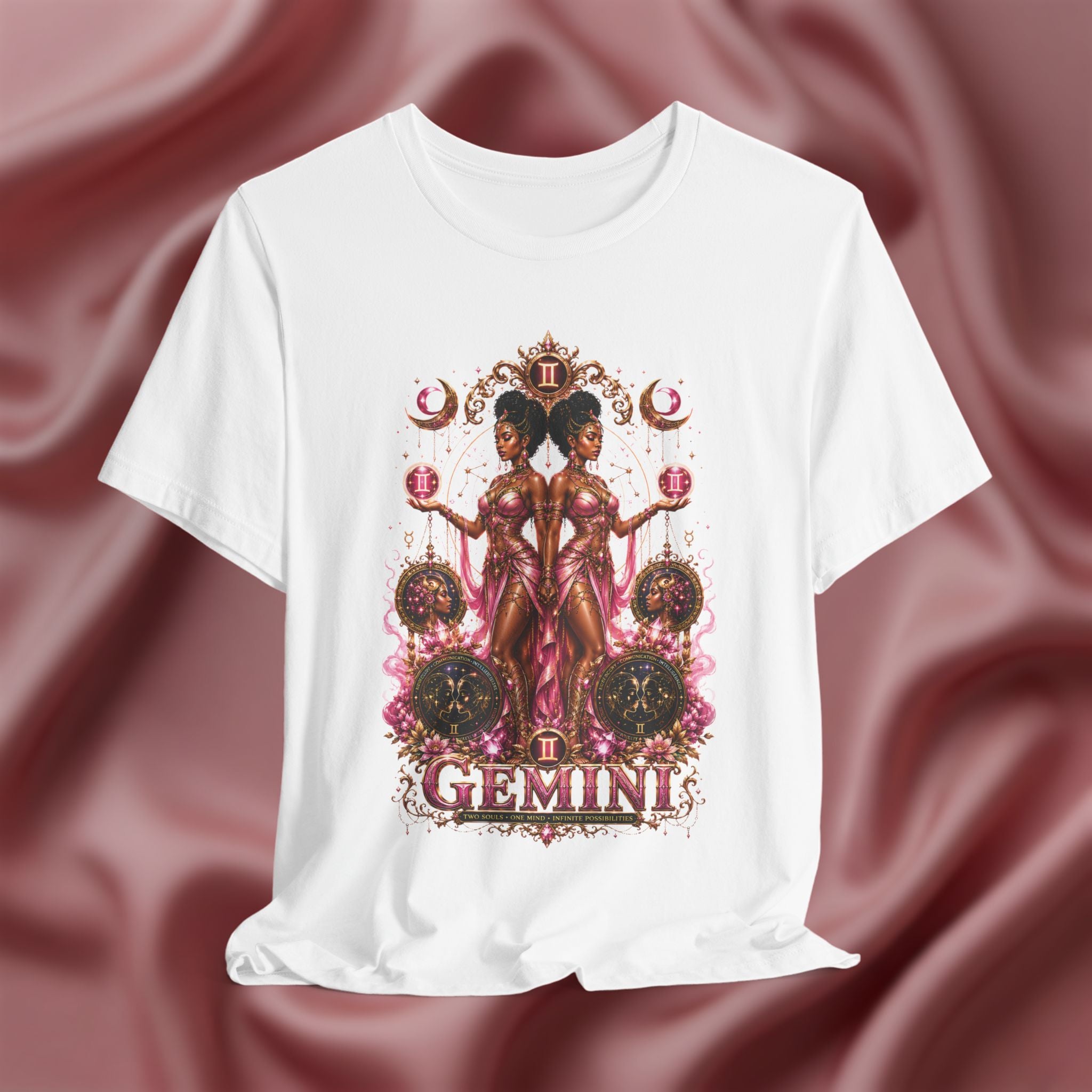 White t-shirt with Gemini zodiac design on a textured pink background