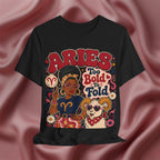 Black t-shirt with Aries zodiac design featuring a woman and ram on a pink fabric background