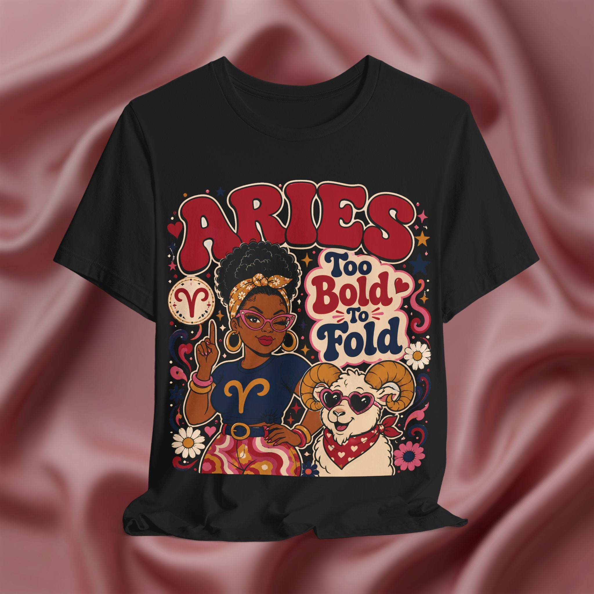 Black t-shirt with Aries zodiac design featuring a woman and ram on a pink fabric background