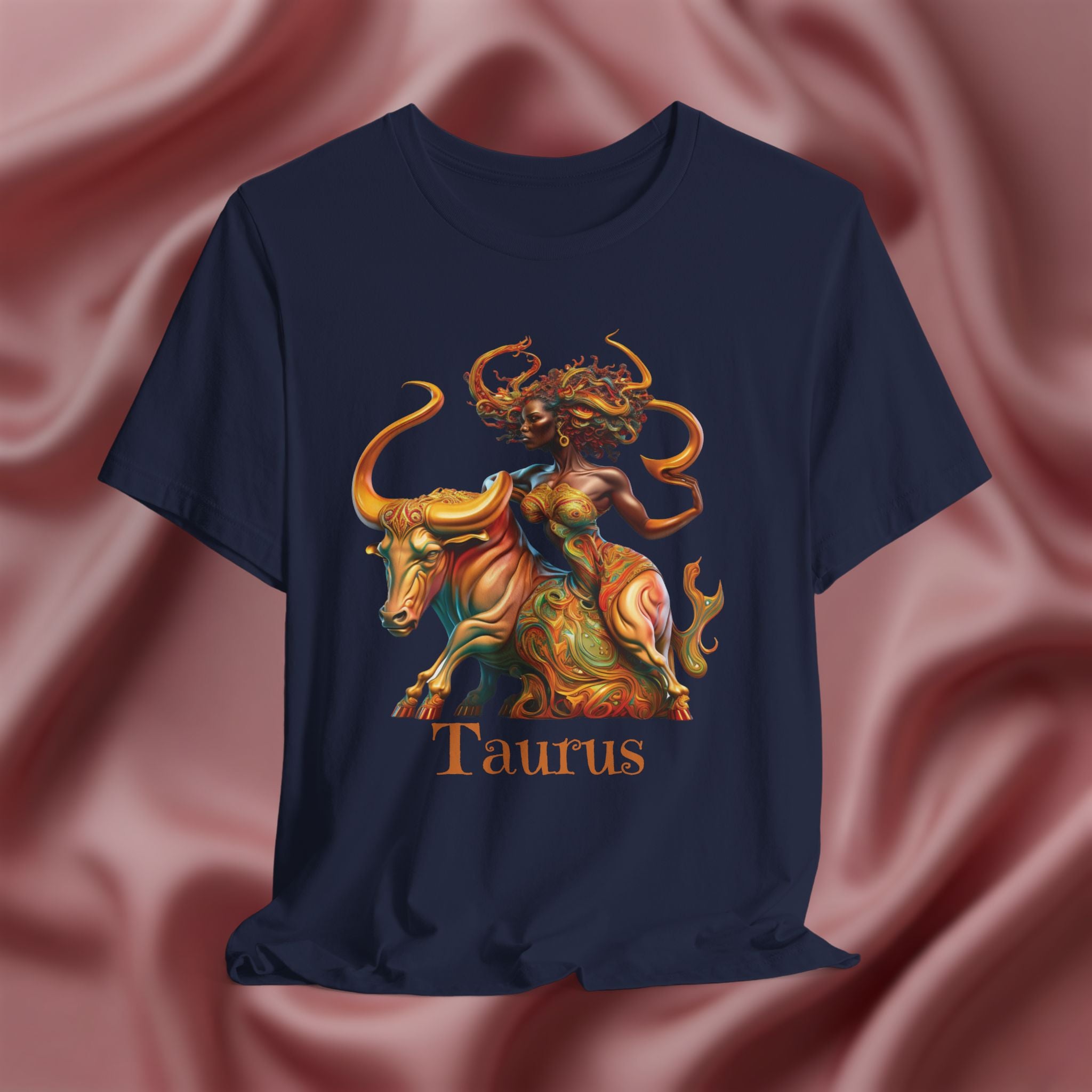 Navy blue t-shirt with colorful Taurus zodiac design featuring a bull and black woman  on a pink fabric background