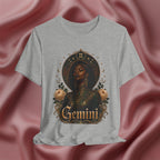 Gray t-shirt with 'Gemini' design featuring a black woman with flowers on a pink fabric background