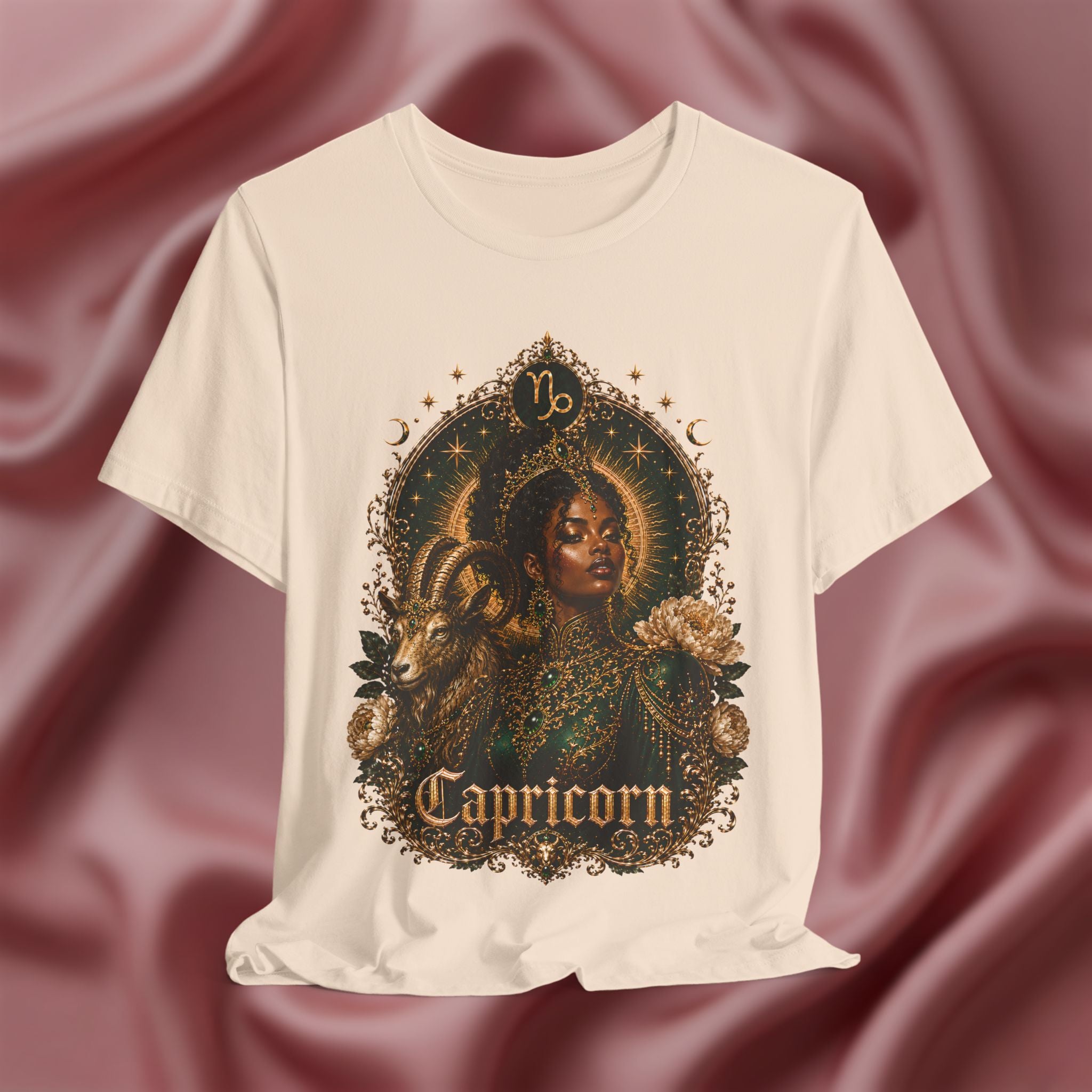 Soft cream T-shirt with Capricorn design on a textured red background