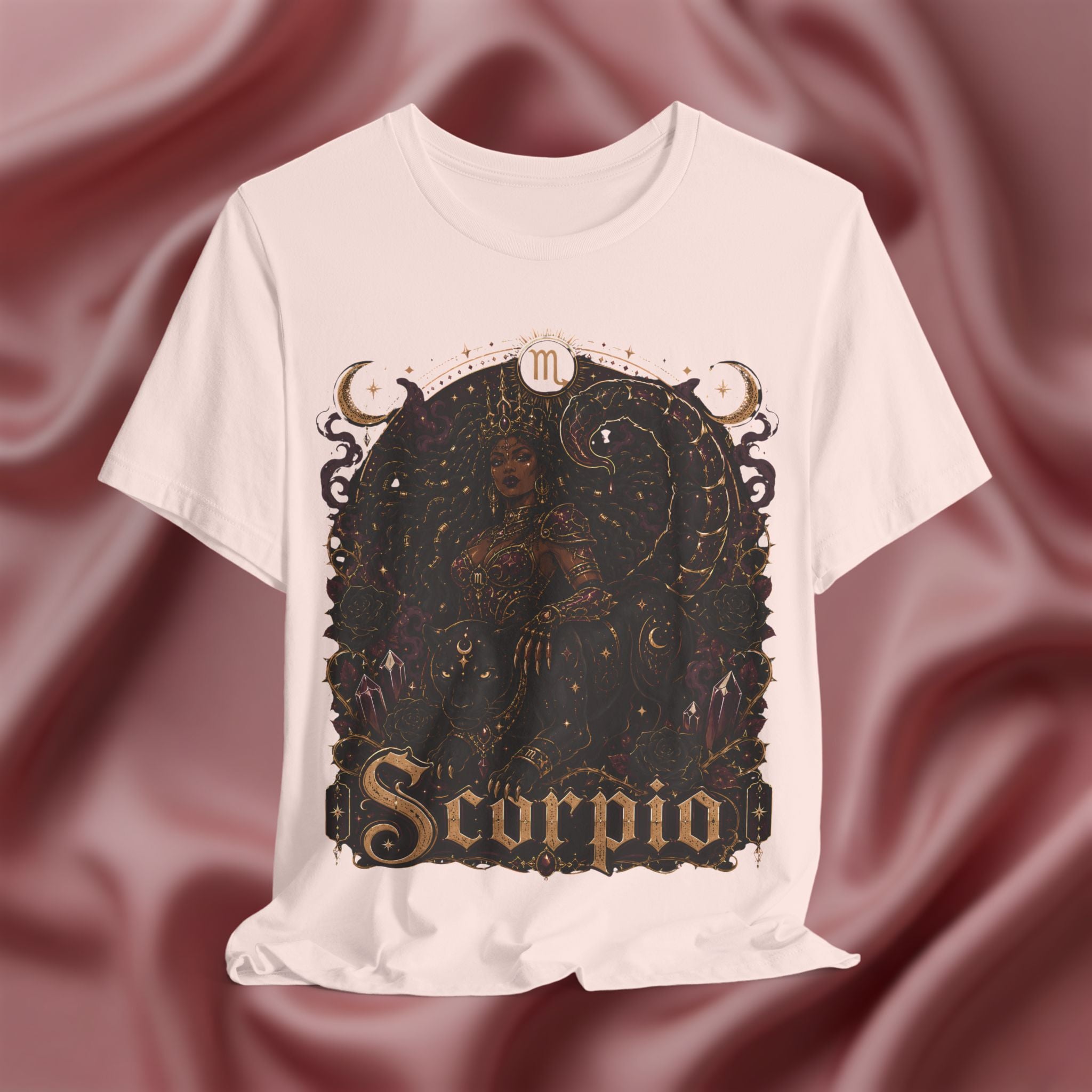 soft pink t-shirt with Scorpio zodiac design