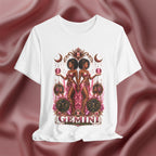 White t-shirt with Gemini twins zodiac design on a pink fabric background