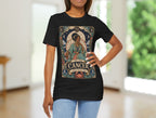 Woman wearing a black t-shirt with a colorful graphic design in a room with blurred background