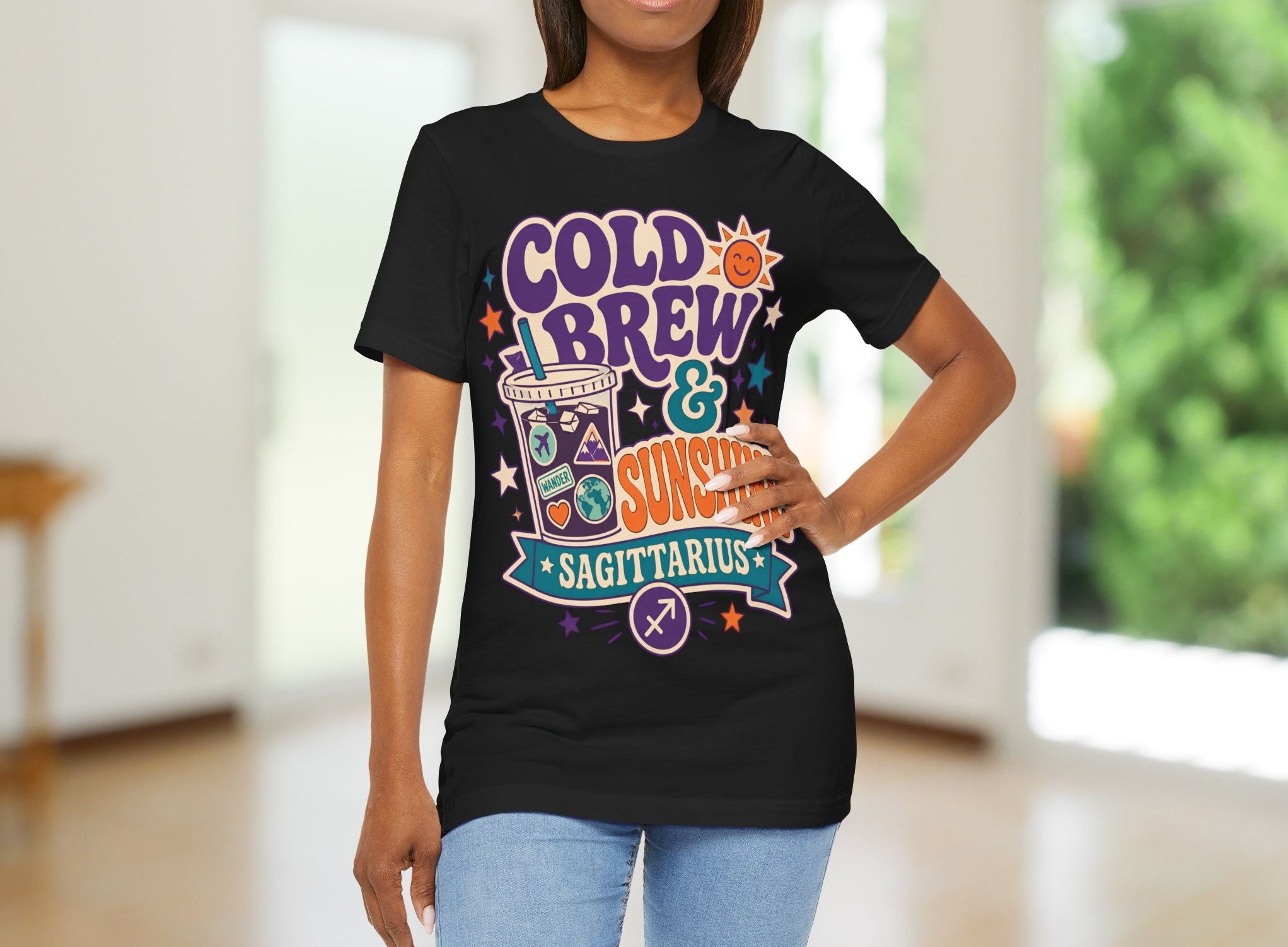 Woman wearing a black t-shirt with 'Cold Brew & Sunshine Sagittarius' design.
