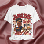 White t-shirt with Aries zodiac design featuring a woman and ram on a maroon fabric background
