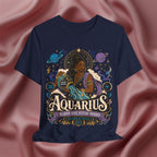 Navy blue t-shirt with Aquarius zodiac design on a pink fabric background