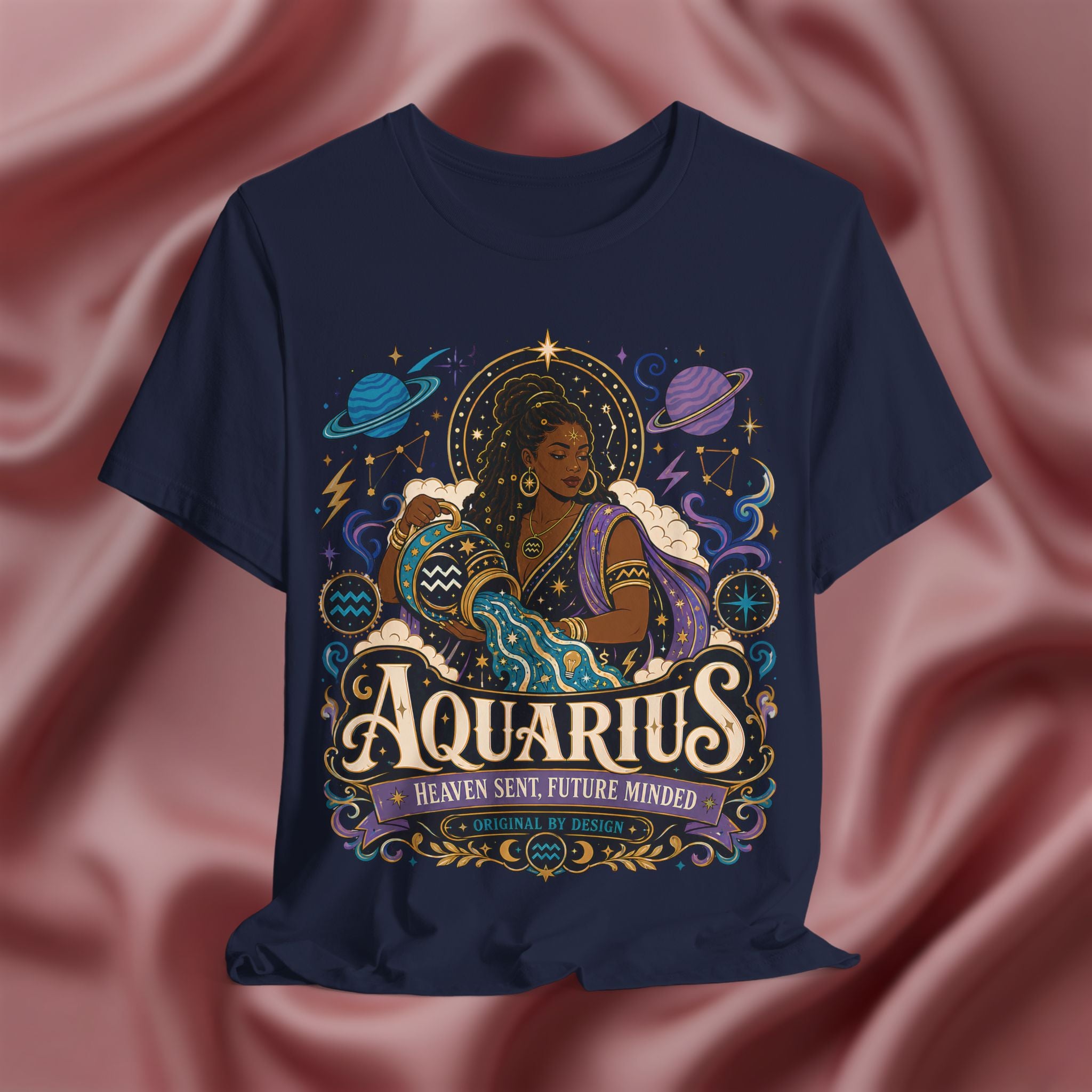 Navy blue t-shirt with Aquarius zodiac design on a pink fabric background