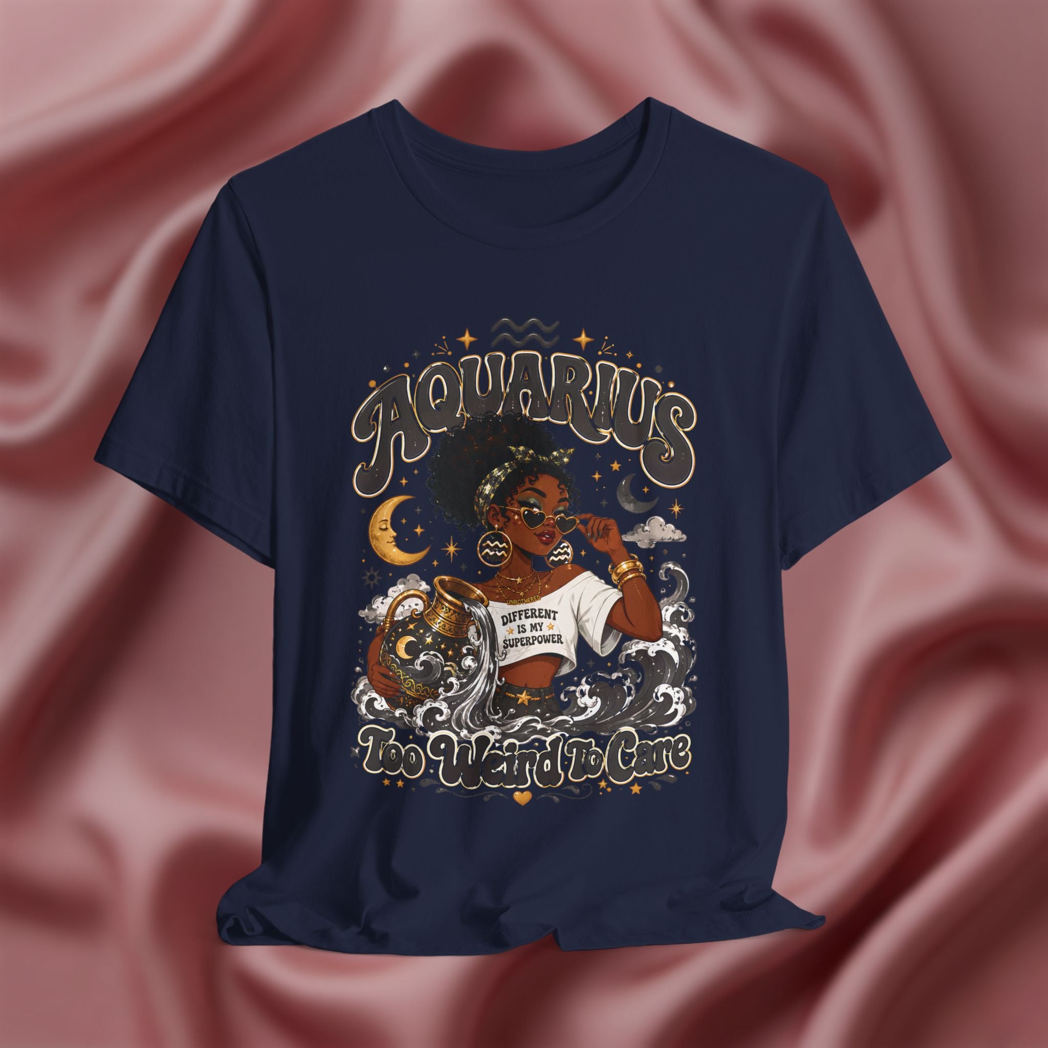 Navy blue t-shirt with 'Aquarius Too Weird To Care' design featuring a black woman wearing a t-shirt with the text 'different is my superpower' on a pink fabric background