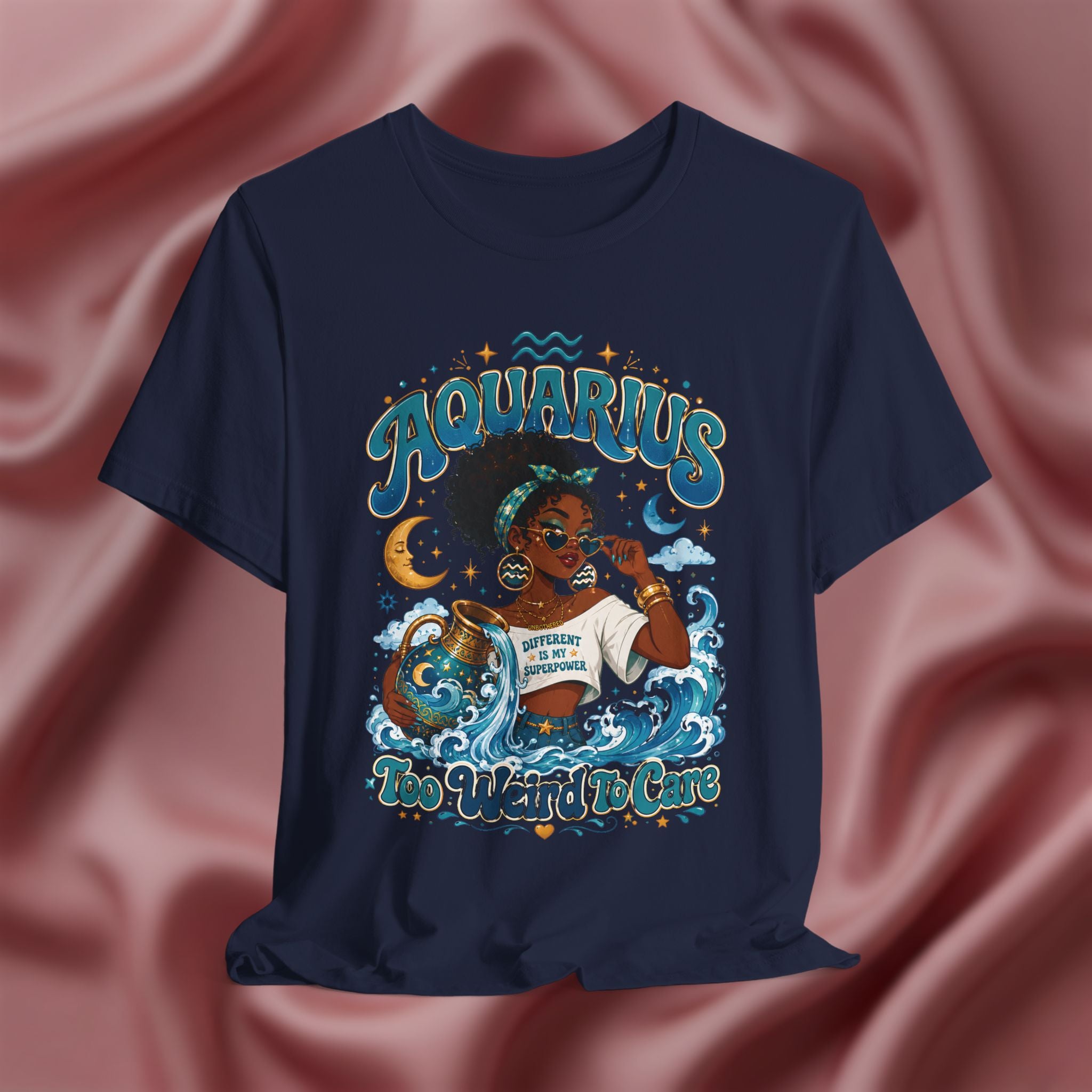 Navy blue t-shirt with 'Aquarius Too Weird To Care' design featuring a black woman wearing a t-shirt with the text 'different is my superpower' on a pink fabric background