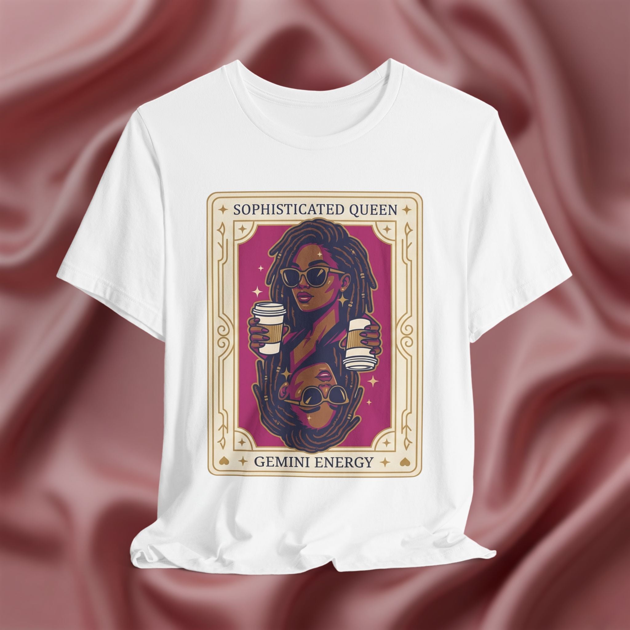 Sophisticated Queen Gemini Energy  White t-shirt with a graphic design of a woman holding coffee cups on a pink fabric background