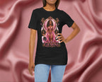 Woman wearing a black t-shirt with 'Gemini' design featuring a woman in a pink dress on a pink fabric background