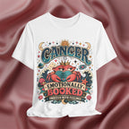 White t-shirt with colorful 'Cancer Emotionally Booked' design on a maroon fabric background