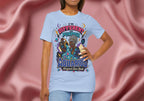 Person wearing a t-shirt with Aquarius design on a pink fabric background