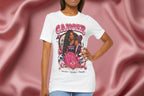 Woman wearing a white t-shirt with Cancer zodiac design featuring a woman on a pink fabric background