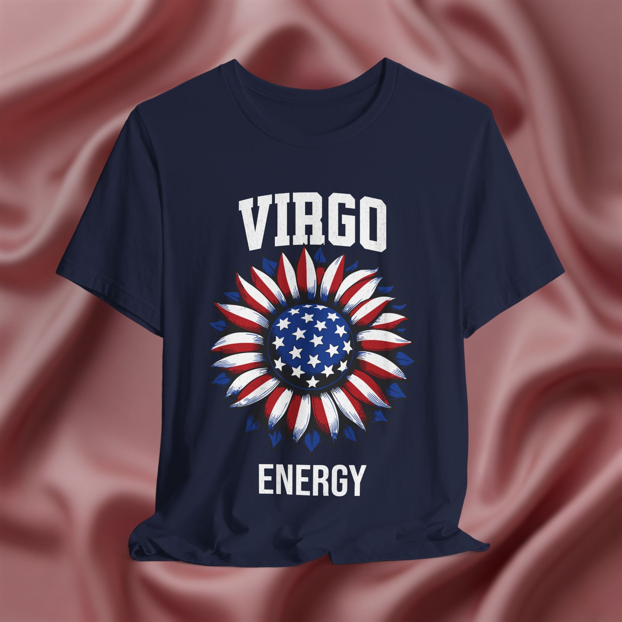 Navy blue t-shirt with American flag sunflower and 'VIRGO ENERGY' text on a textured pink background