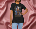 Woman wearing a black t-shirt with 'Aquarius' design featuring a woman in a blue dress on a pink fabric background