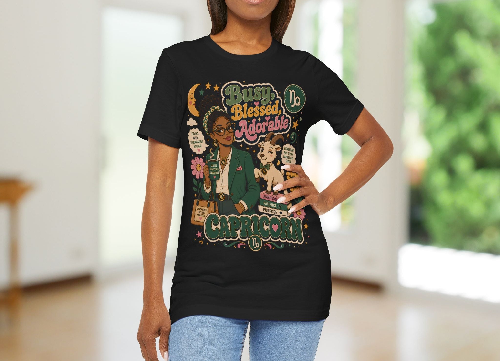 Woman wearing a black t-shirt with colorful Capricorn woman graphics and text.