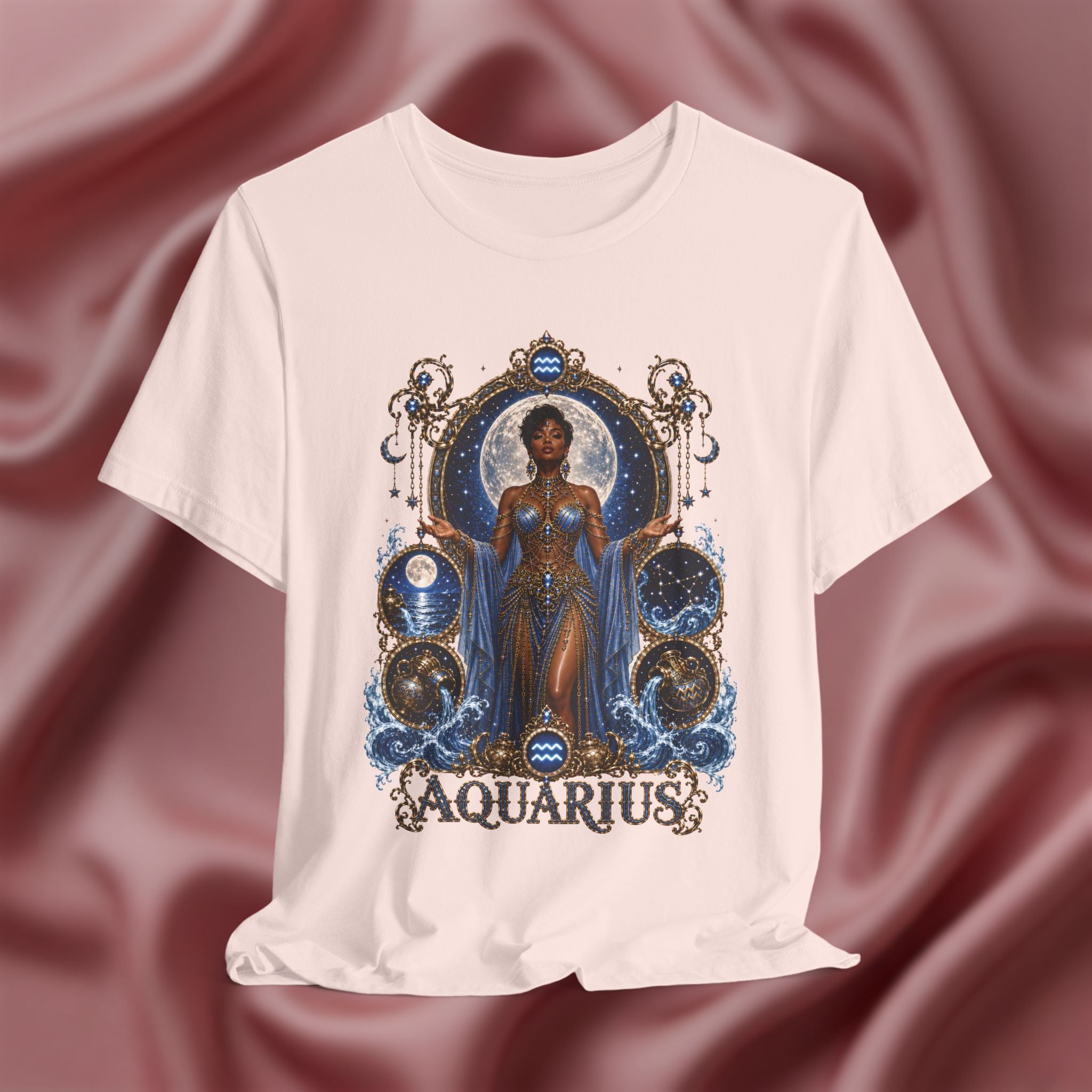 Soft pink t-shirt with 'Aquarius' design featuring a woman in a blue dress on a pink fabric background