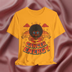 Gold Yellow t-shirt with a graphic design of a person with an afro and 'Cancer Energy' text on a pink fabric background.
