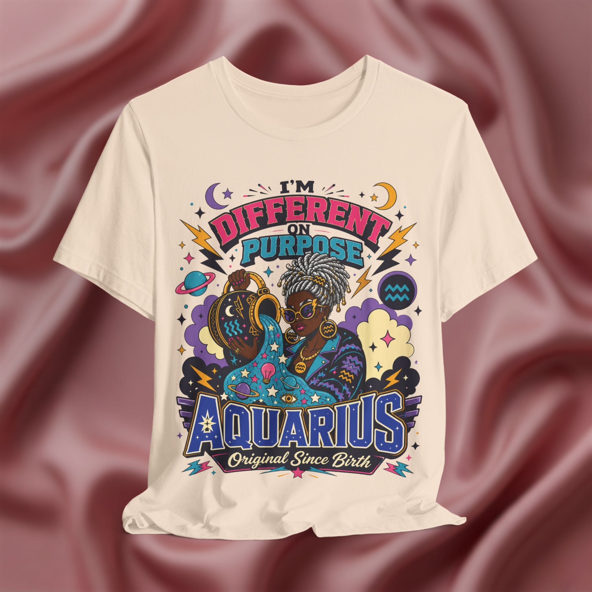 soft cream T-shirt with Aquarius design and text on a textured brown background