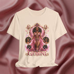 Soft cream T-shirt with 'Gemini' design featuring a woman in a pink dress on a pink fabric background