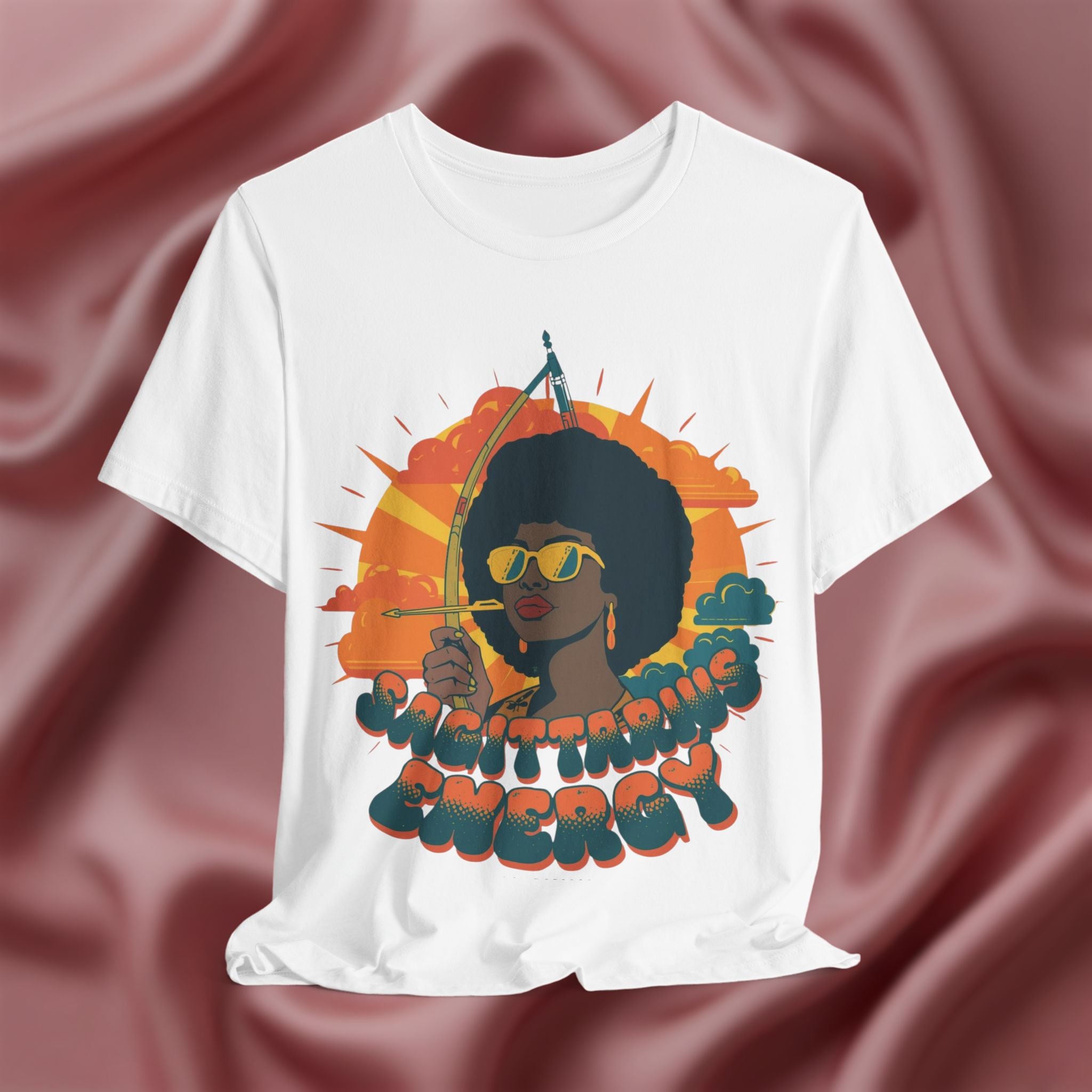 White t-shirt with a graphic of a woman holding an arrow and the text 'Sagittarius Energy'