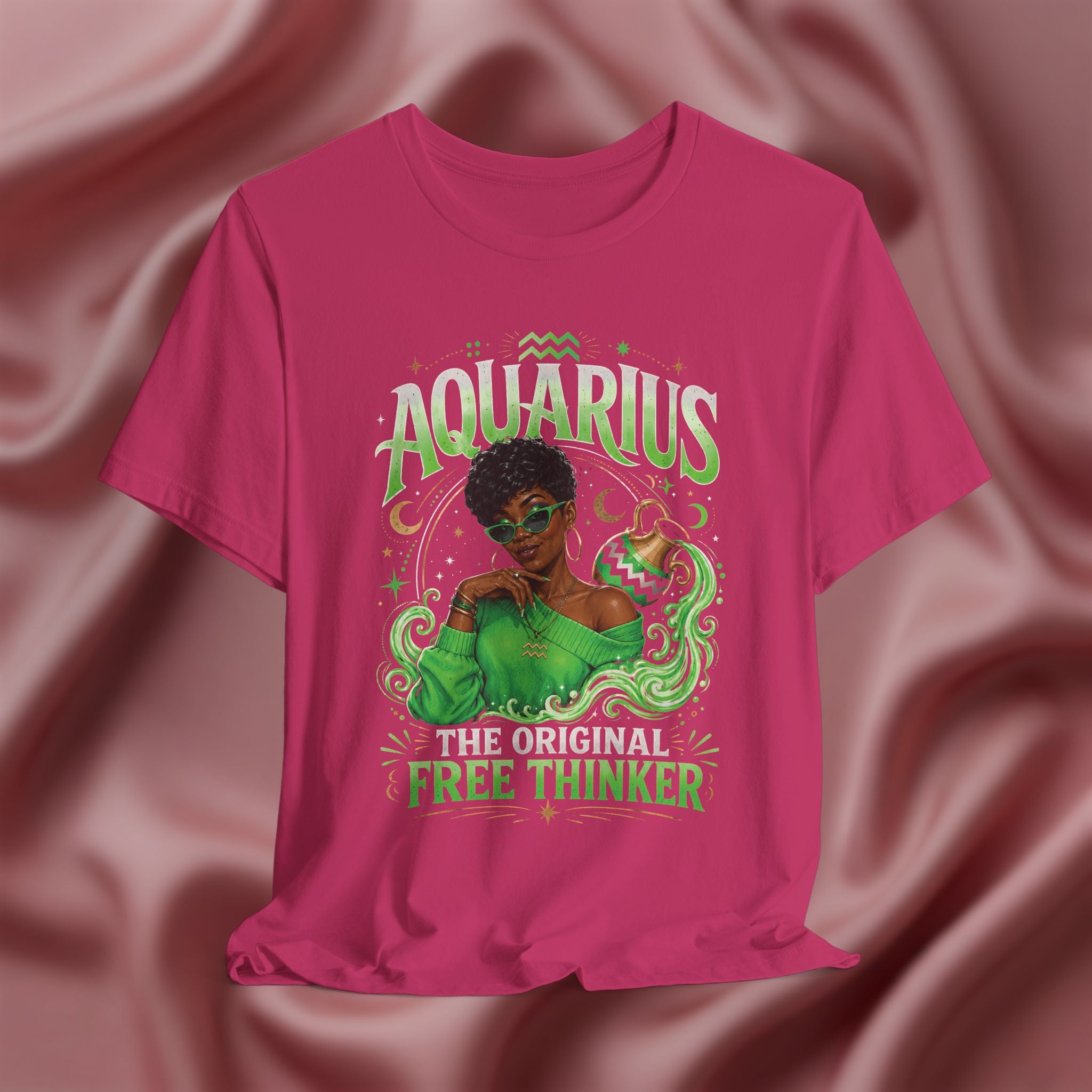 Pink t-shirt with Aquarius design featuring a black woman and text 'The original free thinker' on a pink fabric background