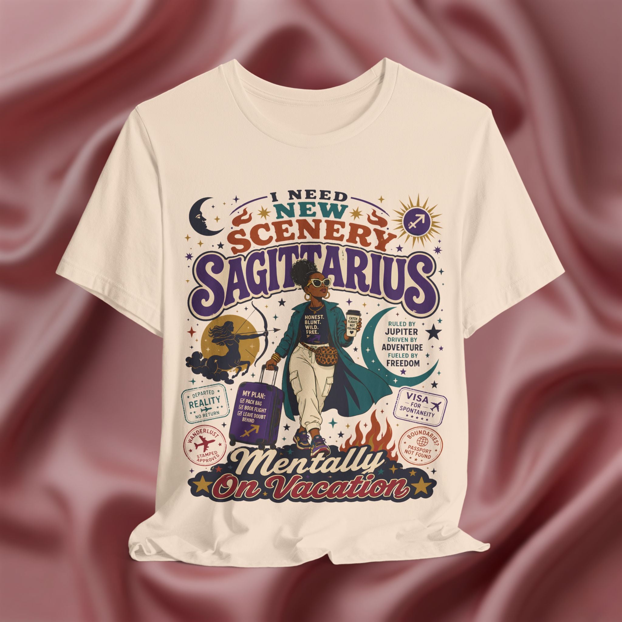 Soft cream T-shirt with Sagittarius zodiac design on a textured red background