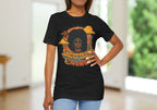 Woman wearing a black t-shirt with 'Sagittarius Energy' design on a pink fabric background