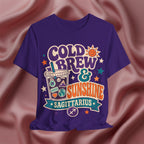 Purple t-shirt with 'Cold Brew & Sunshine Sagittarius' design