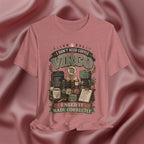 A heather mauve graphic t-shirt featuring a vintage-style 'Virgo' coffee enthusiast design, displayed against a draped satin fabric background of a matching color.