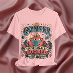 Pink t-shirt with Cancer zodiac design on a maroon fabric background