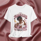 White t-shirt with 'Aquarius Too Weird To Care' design featuring a black woman wearing a t-shirt with the text 'different is my superpower' on a pink fabric background