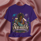 Purple t-shirt with Aquarius zodiac design on a textured pink background
